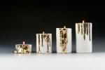 A csöpögő arany „olvadó viasszal” rendelkező porcelán gyertyatartóknak van tényezője
